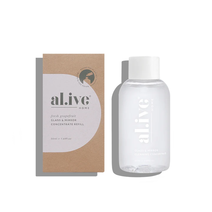 Clear bottle and brown box with 'alive' branding on a white background
