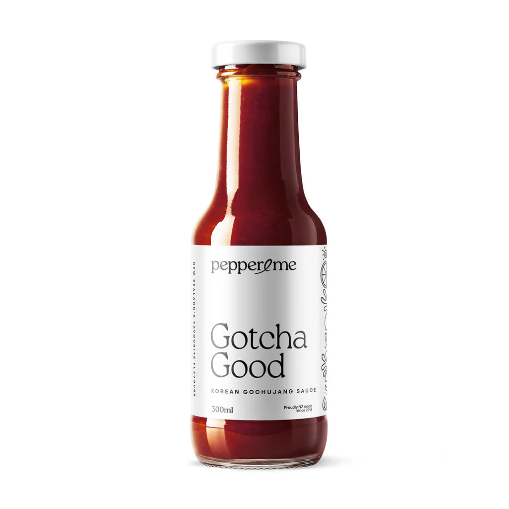 Bottle of pepperme 'Gotcha Good' sauce on a white background
