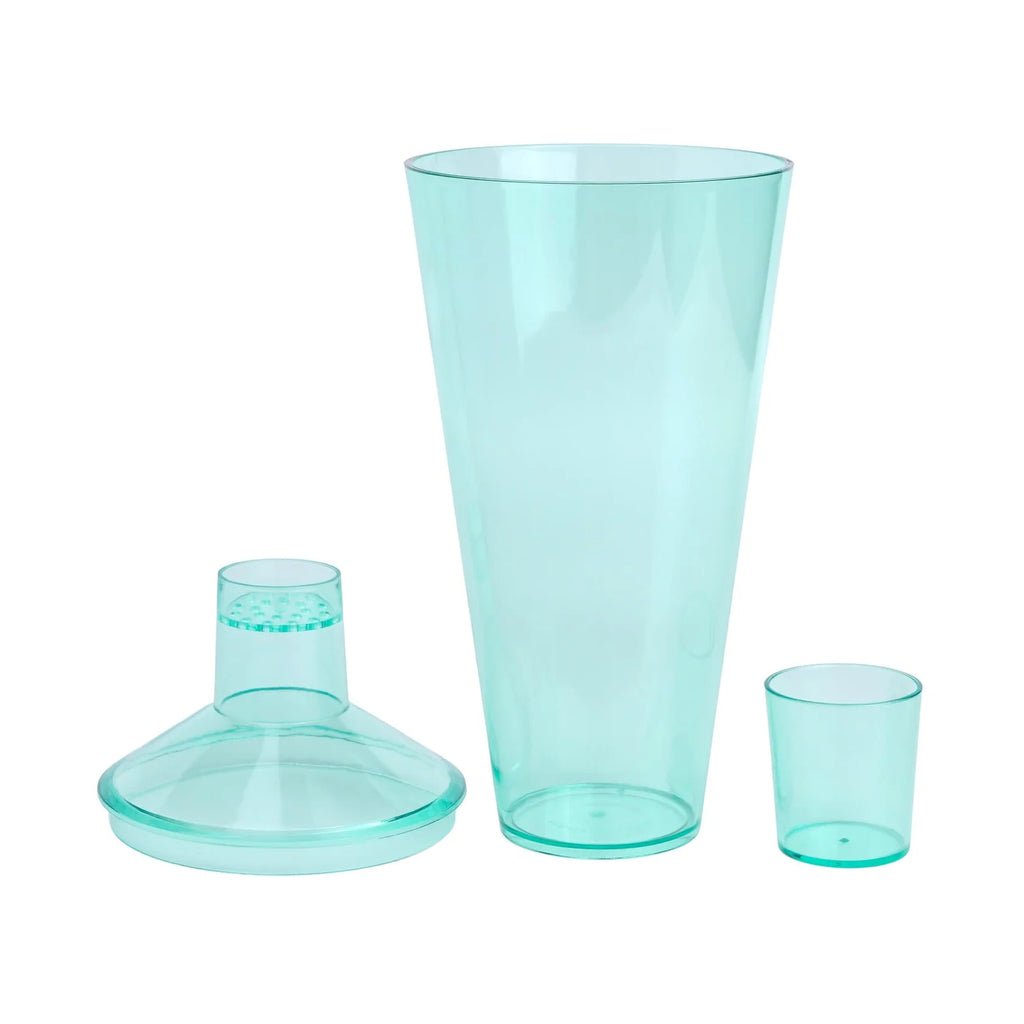 Turquoise plastic shaker in parts  on a white background