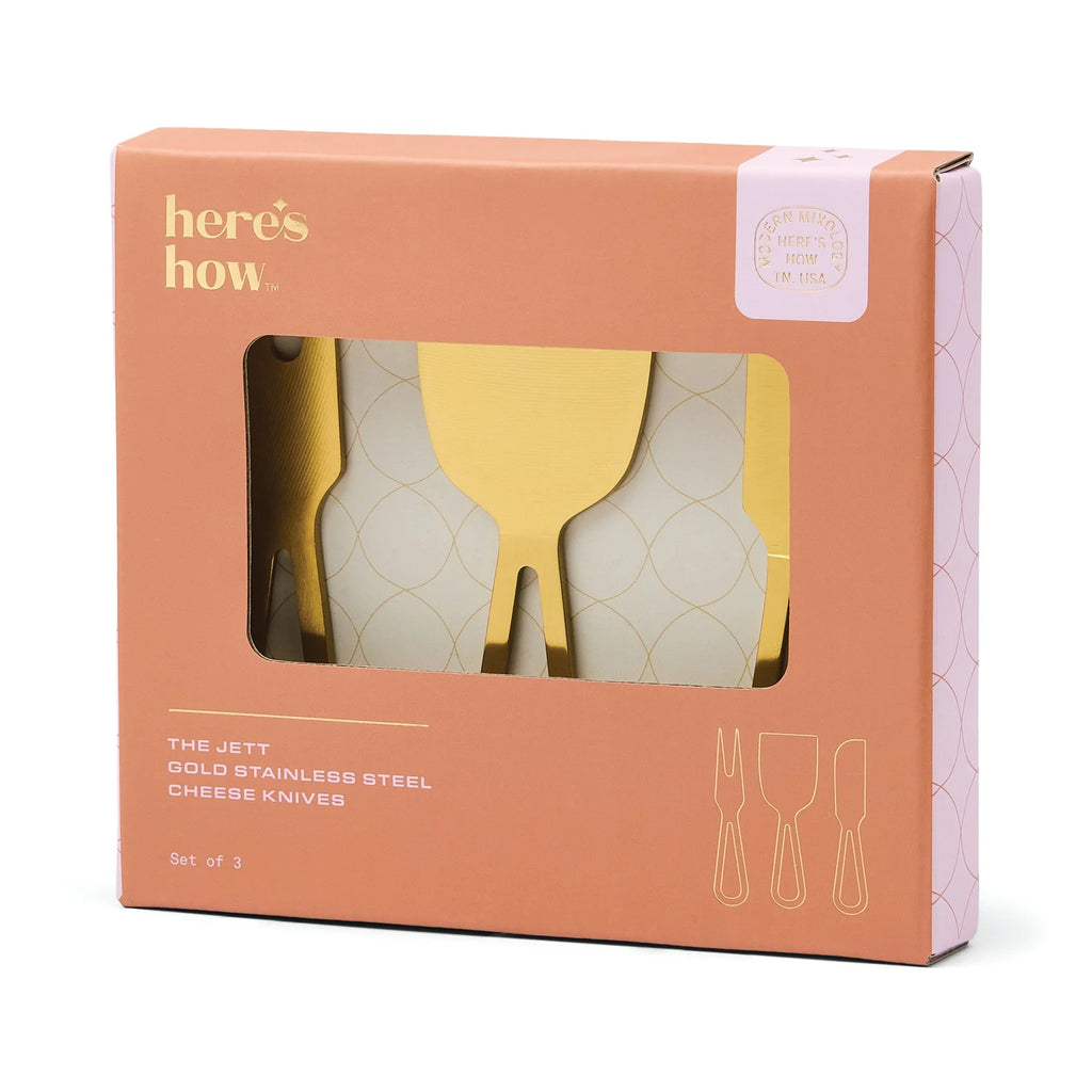 Packaging of cheese knives with 'here's how' branding on a white background