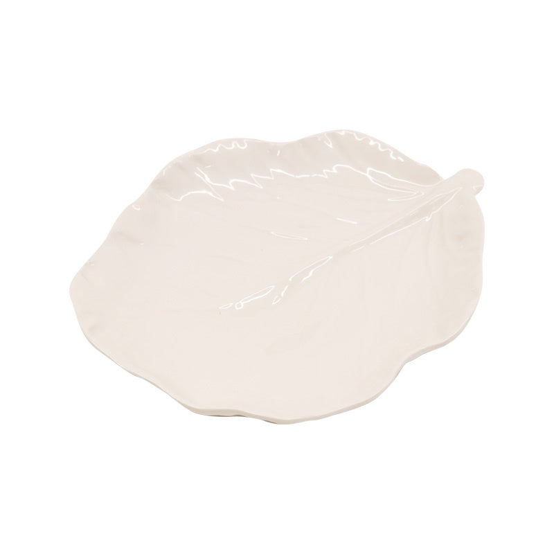 White melamine leaf-shaped plate on a white background