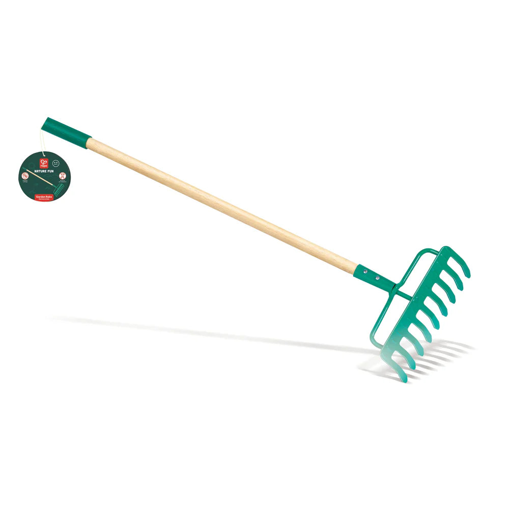 Green garden rake with wooden handle on a white background