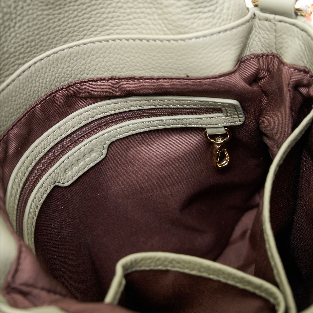 Close-up of a bag with a zipper and handle