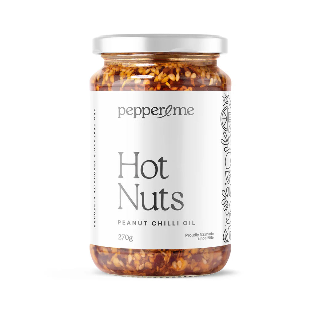 Jar of 'Hot Nuts' with 'pepper & me' label on a white background