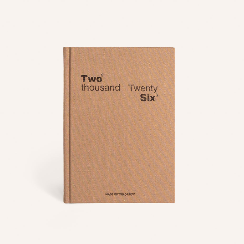 Brown diary with 'Two thousand Twenty Six' text on a white background
