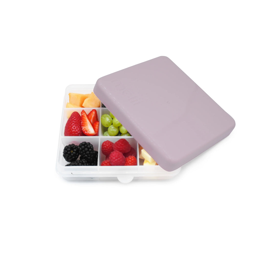 Fruit compartment with a purple lid on a white background