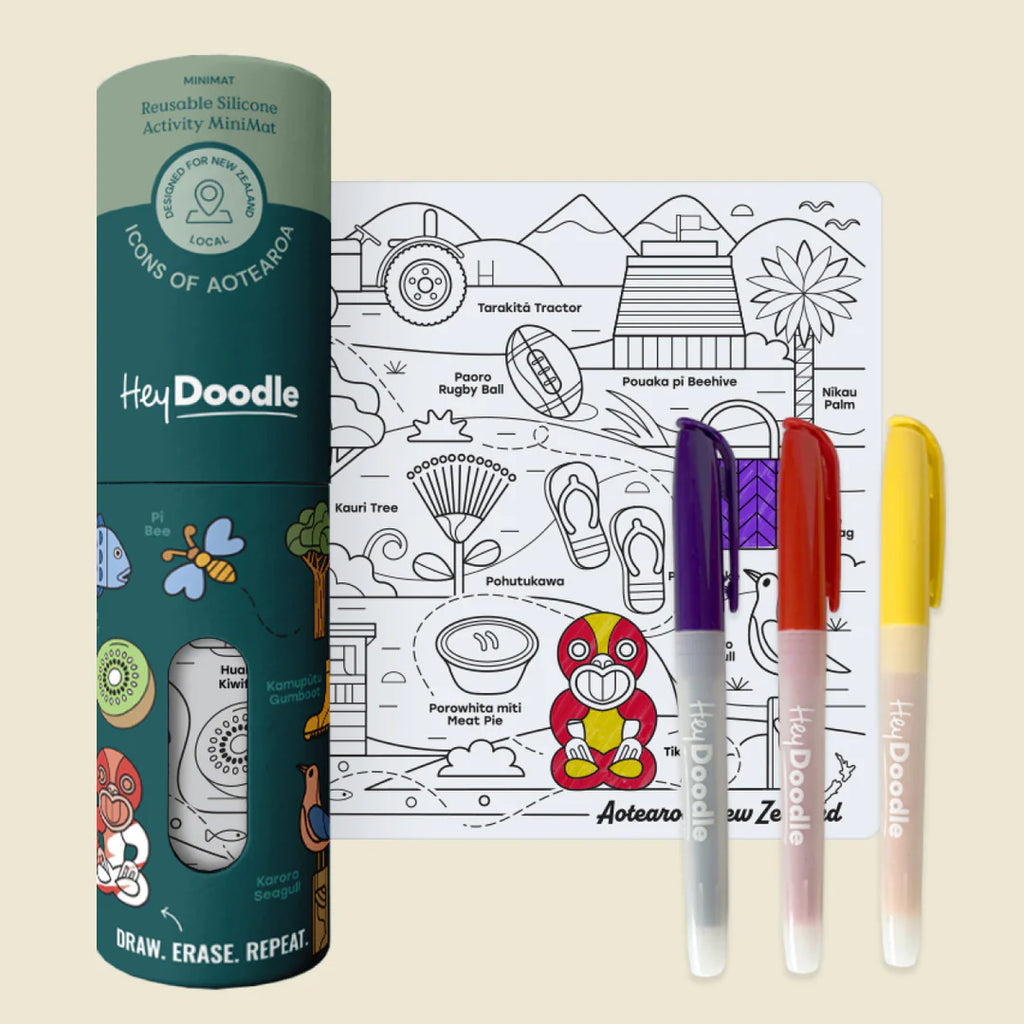 HeyDoodle product set with coloring book and markers on a beige background