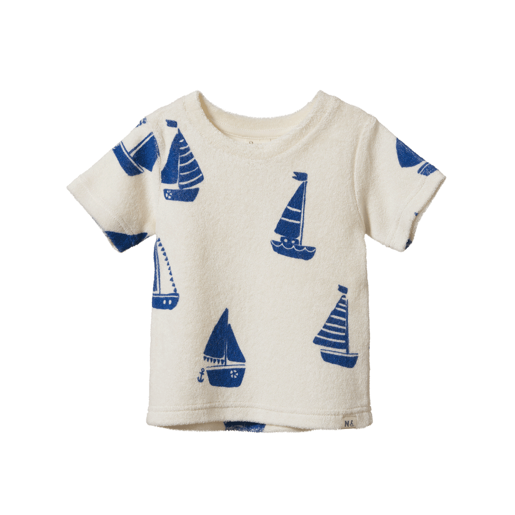 Children's t-shirt with blue sailboat pattern on a white background
