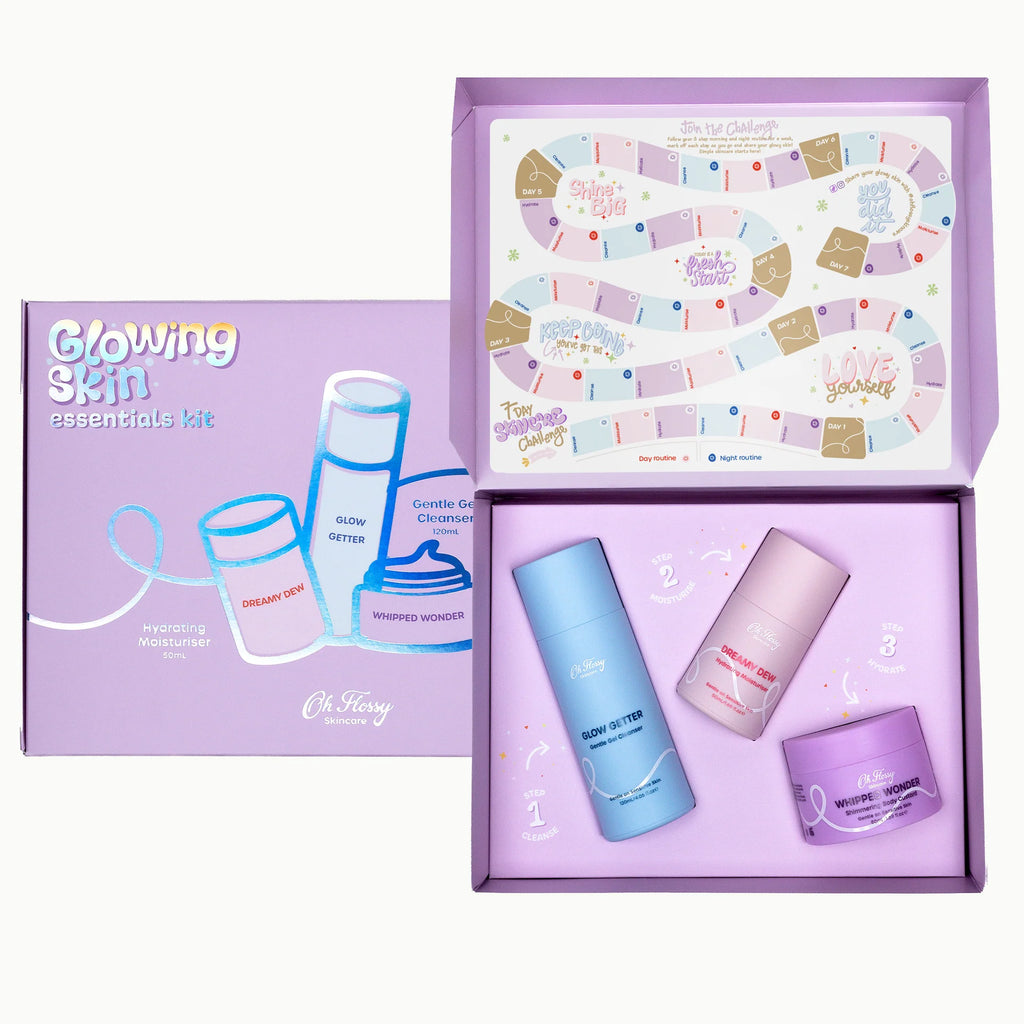 Skincare product set with containers and a board game in a box, branded 'Oh! Cherry'.