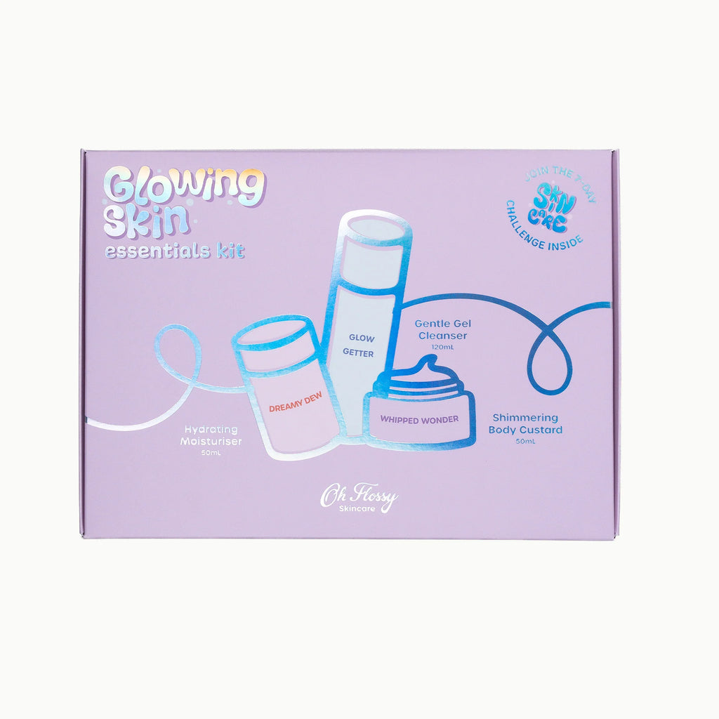 Glowing Skin essentials kit packaging with product illustrations on a purple background