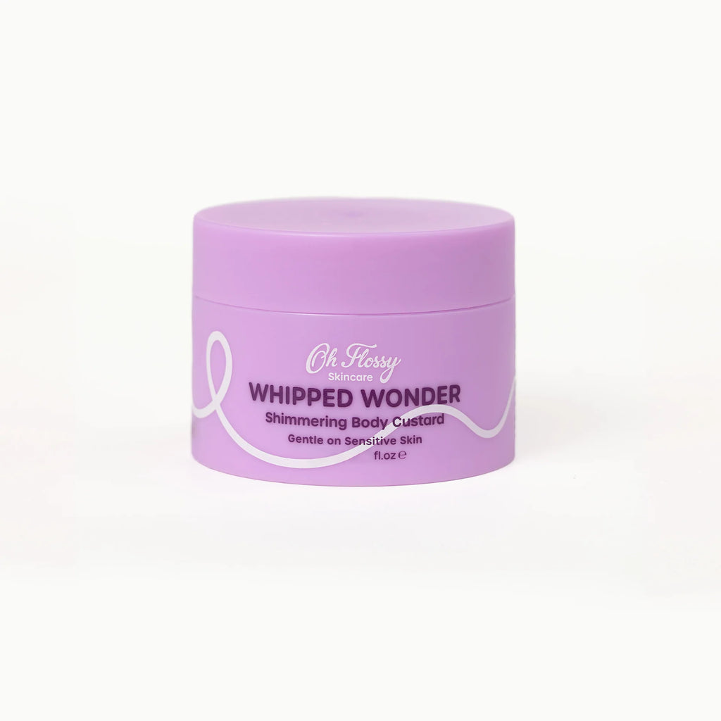 Purple jar of 'Whipped Wonder' body custard on a white background