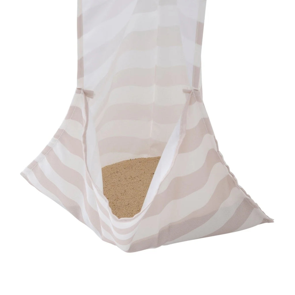 Striped fabric bag with a textured interior on a white background