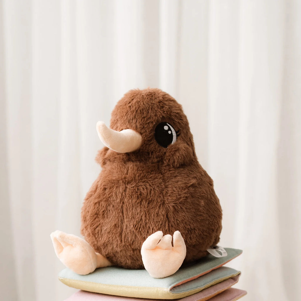 Plush toy resembling a brown kiwibwith large eyes and long beak on a white background