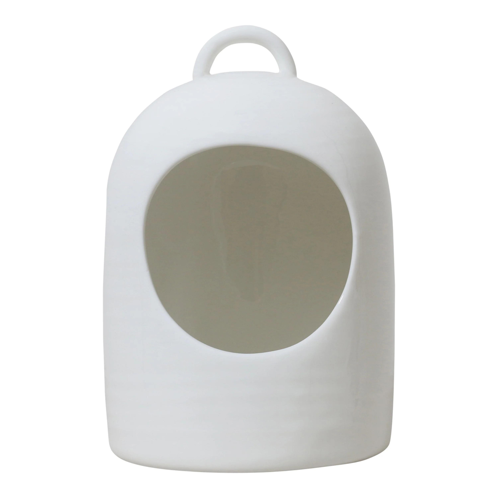 A white ceramic salt pig against a white background 