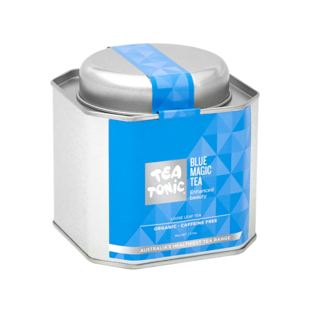 A silver tin with a lid and a blue label stating "tea tonic blue magic tea"