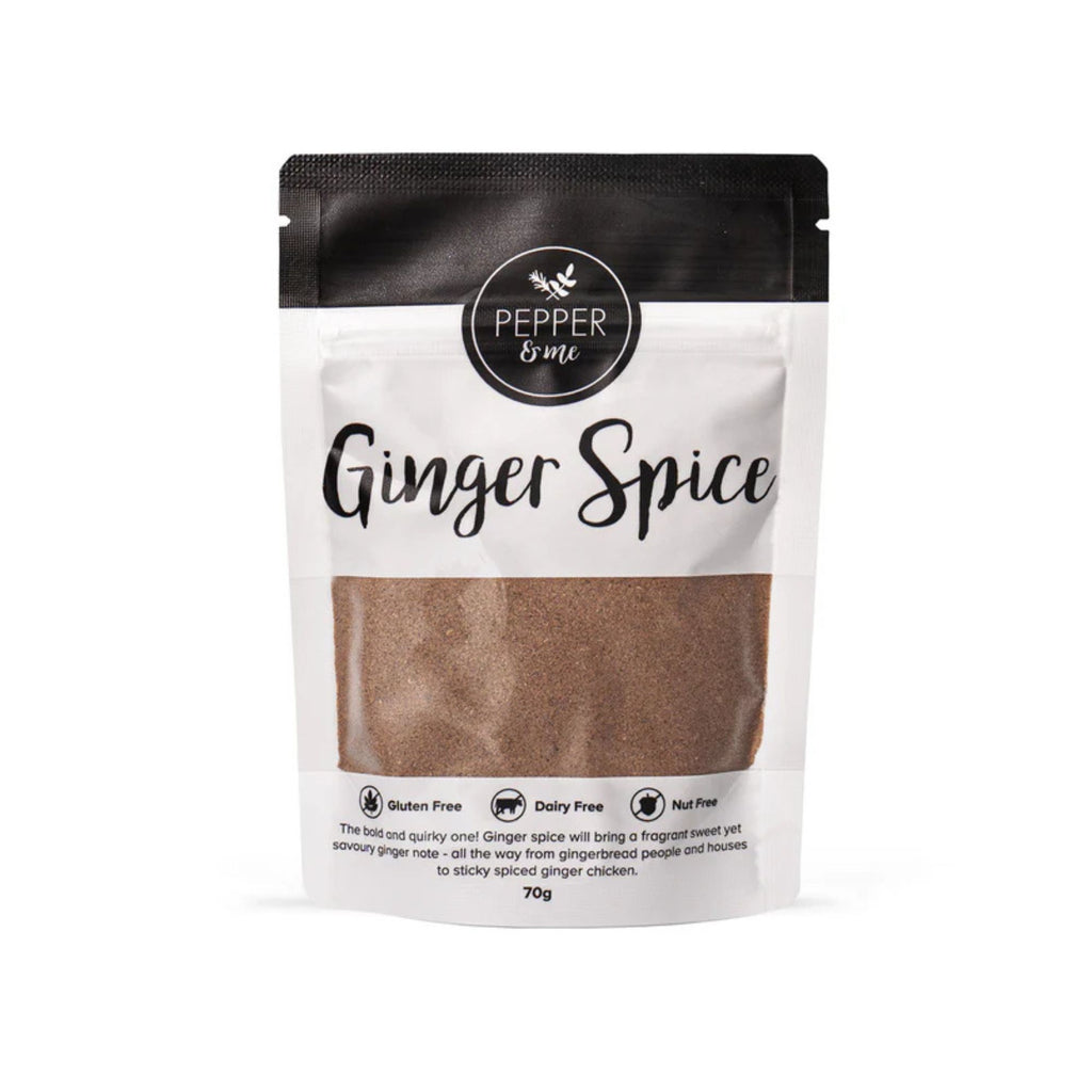 White and black pouch with clear window displaying a brown ginger spice mix from Pepper & Me labelled "Ginger Spice"