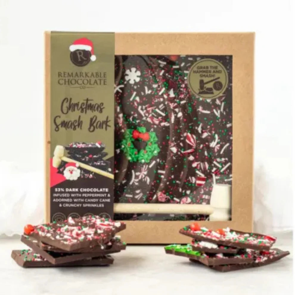 Christmas-themed chocolate bark with packaging on a white background