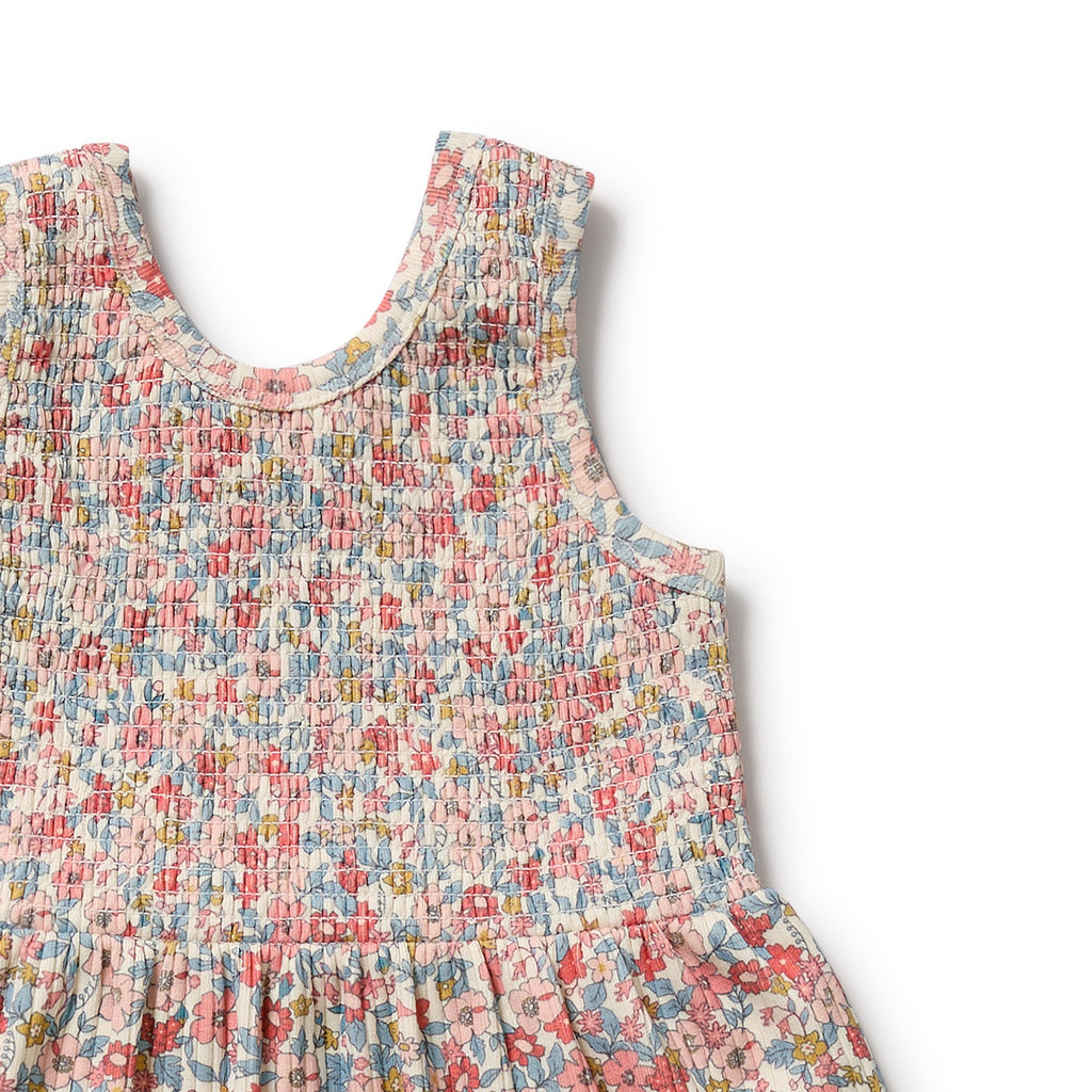 Floral patterned dress on a white background