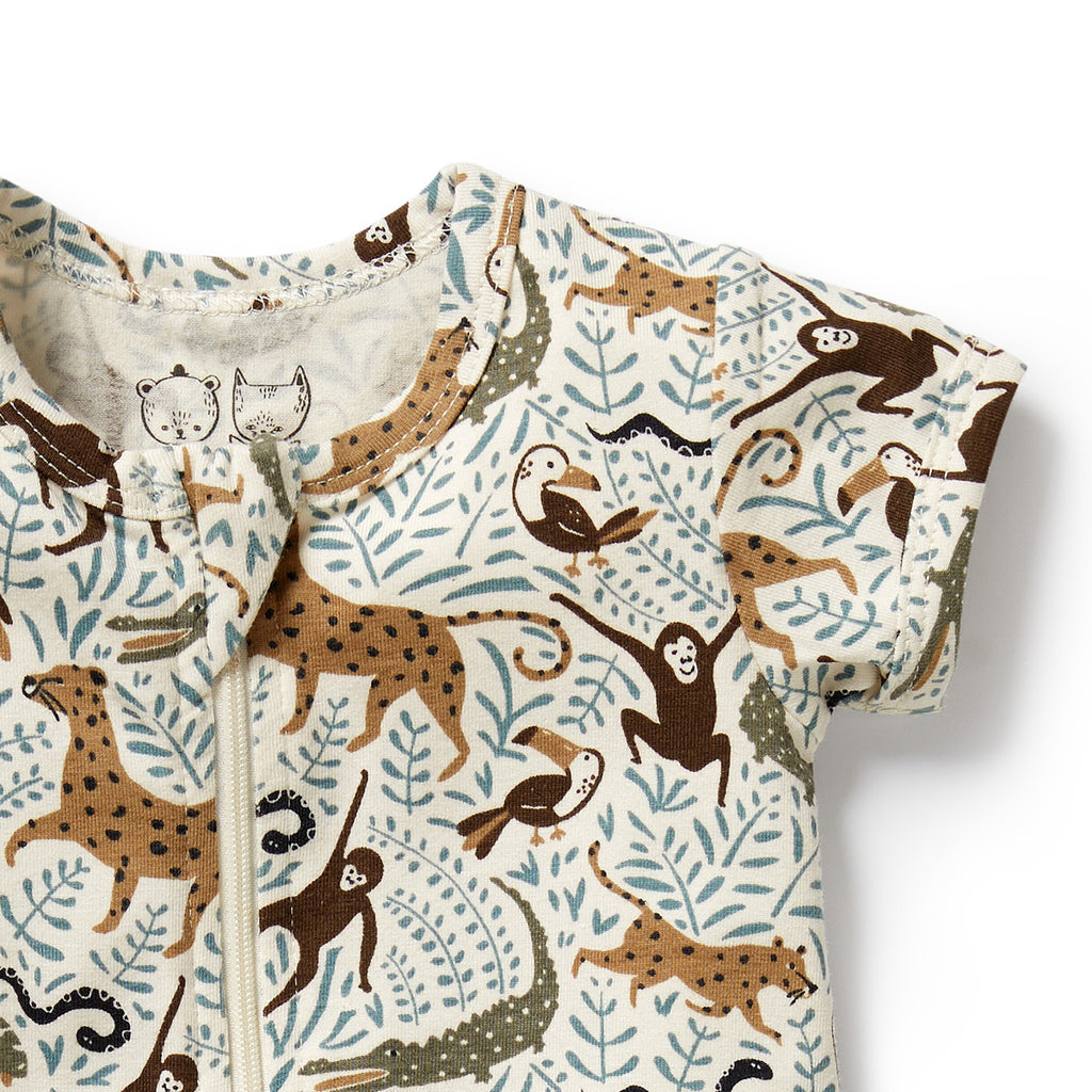 Baby onesie with animal pattern on a white background
