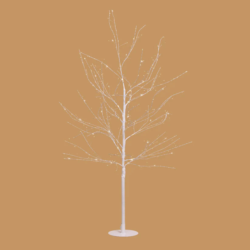 Decorative white LED tree on a brown background