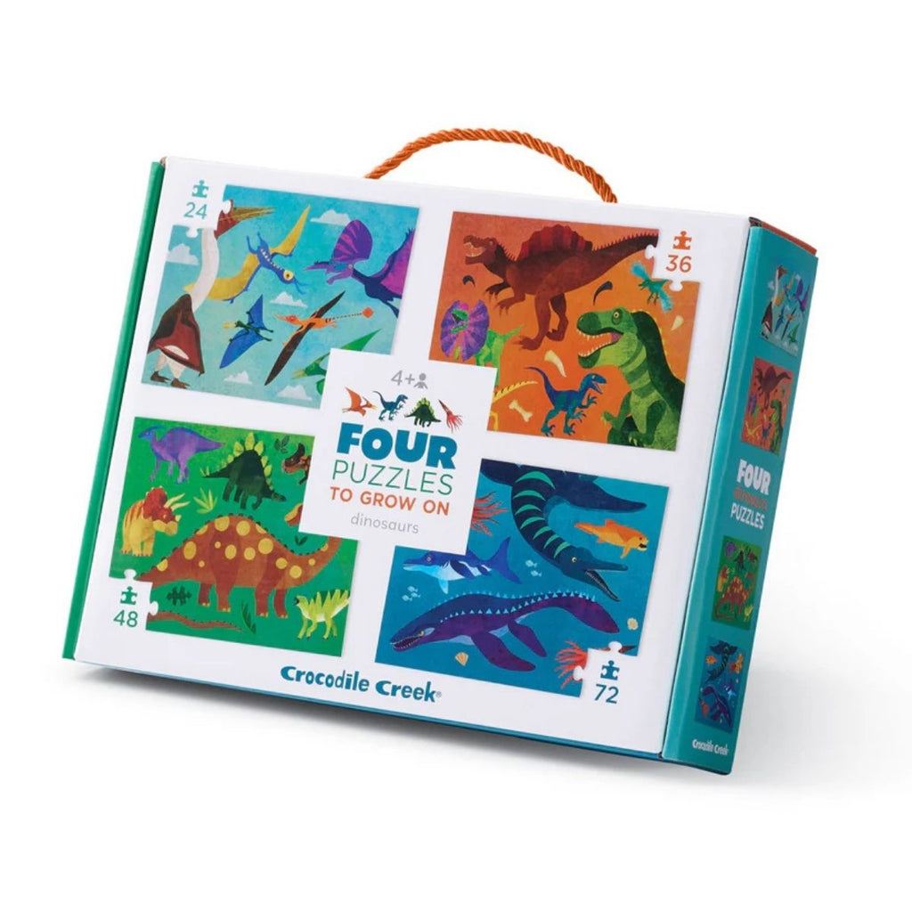 Dinosaurs- Four Puzzles- 24pc, 36pc, 38pc, 72pc. Puzzle box with 4 different puzzle images featuring dinosaurs