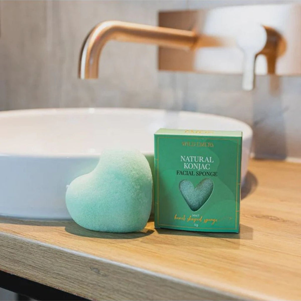Natural Konjac Sponge - Mint colour. Box and sponge sitting on a bathroom bench 