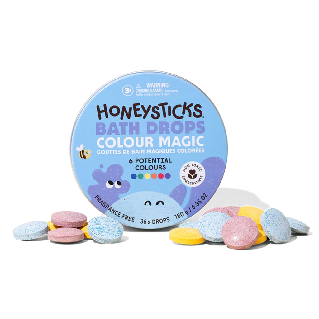 Honeysticks Bath Drops Colour Magic packaging with colorful bath bombs on a white background