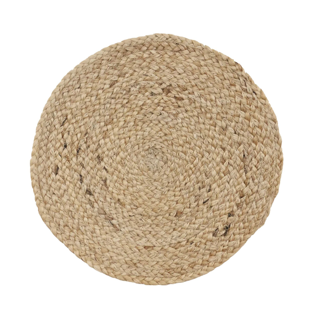 Round woven mat made of natural fibers on a white background