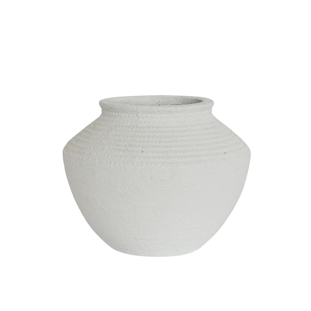 White textured vase on a white background