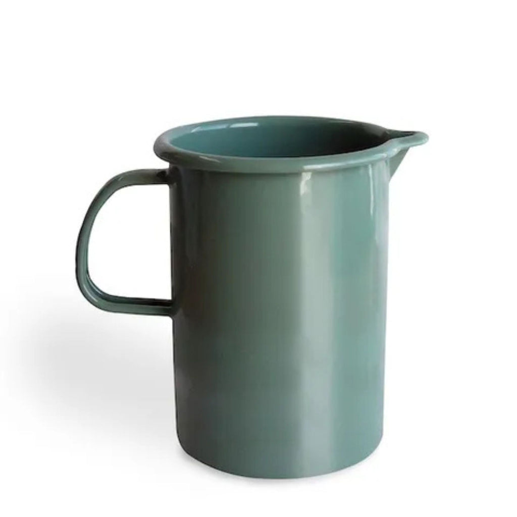 Green pitcher on a white background