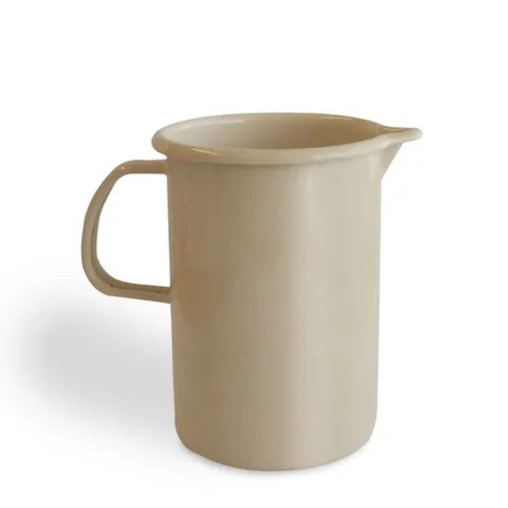 Beige pitcher on a white background