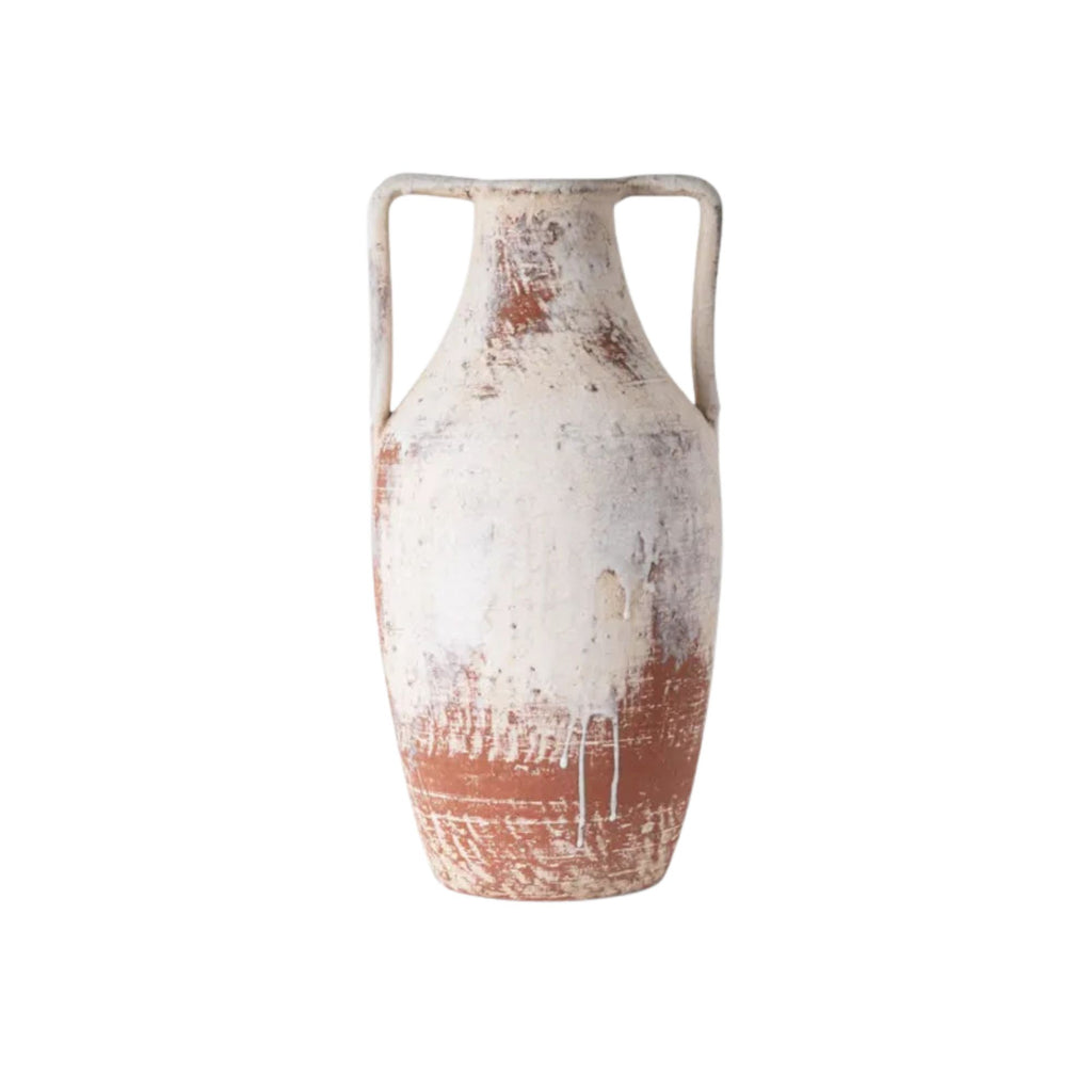 Vintage-style ceramic vase with two handles on a white background