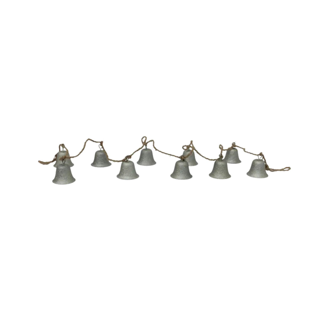 String of small bells on a white background