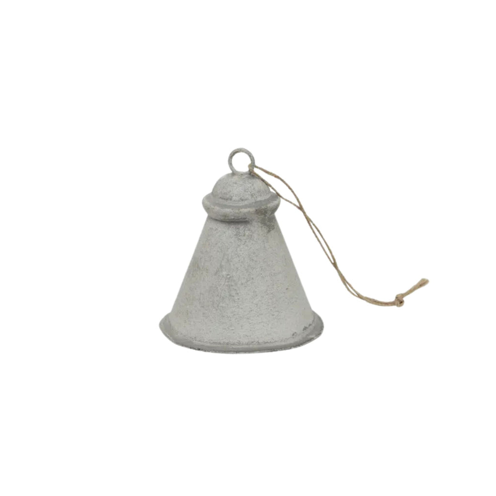 Small gray bell with a string on a white background