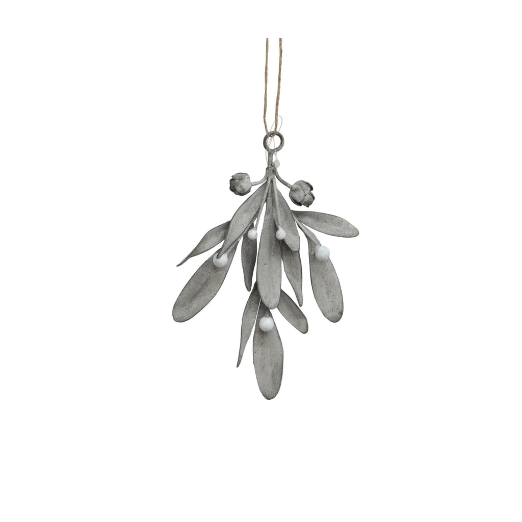 Decorative mistletoe ornament on a white background