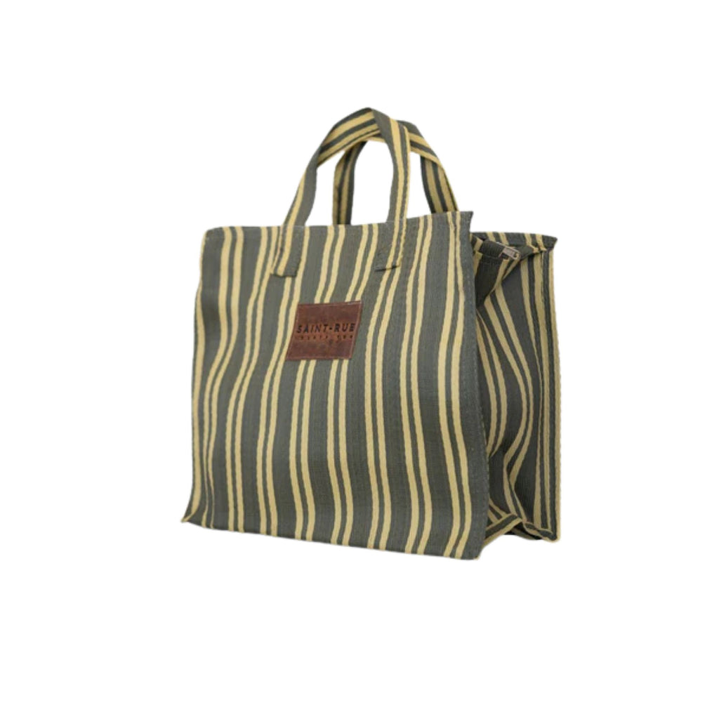 Striped tote bag with a brown leather patch on a white background