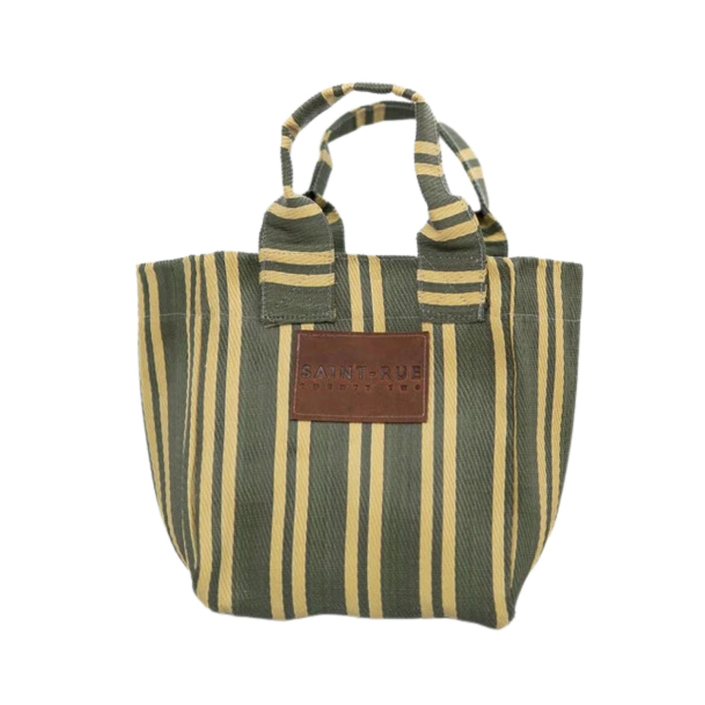 Green and beige striped tote bag with a brown leather patch on a white background