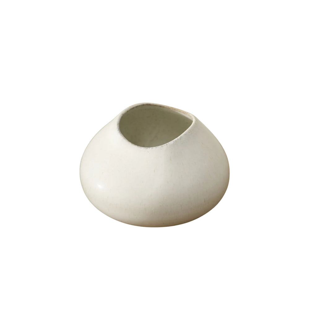 White ceramic vase on a white background