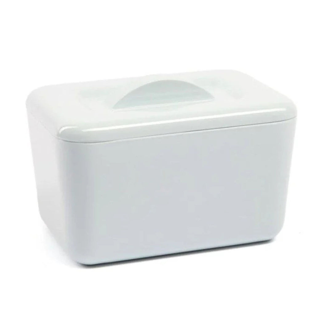 White ceramic butter dish with lid on a white background