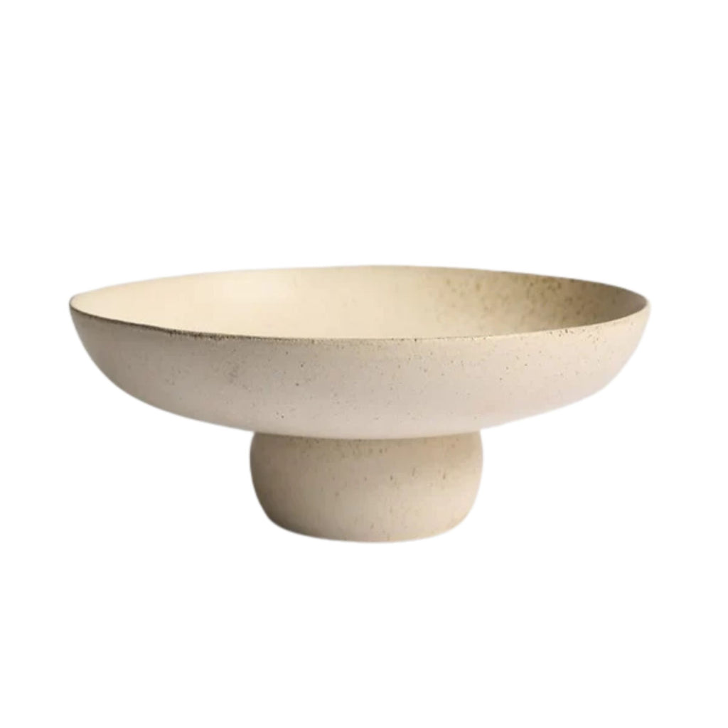 Beige ceramic bowl on a white background