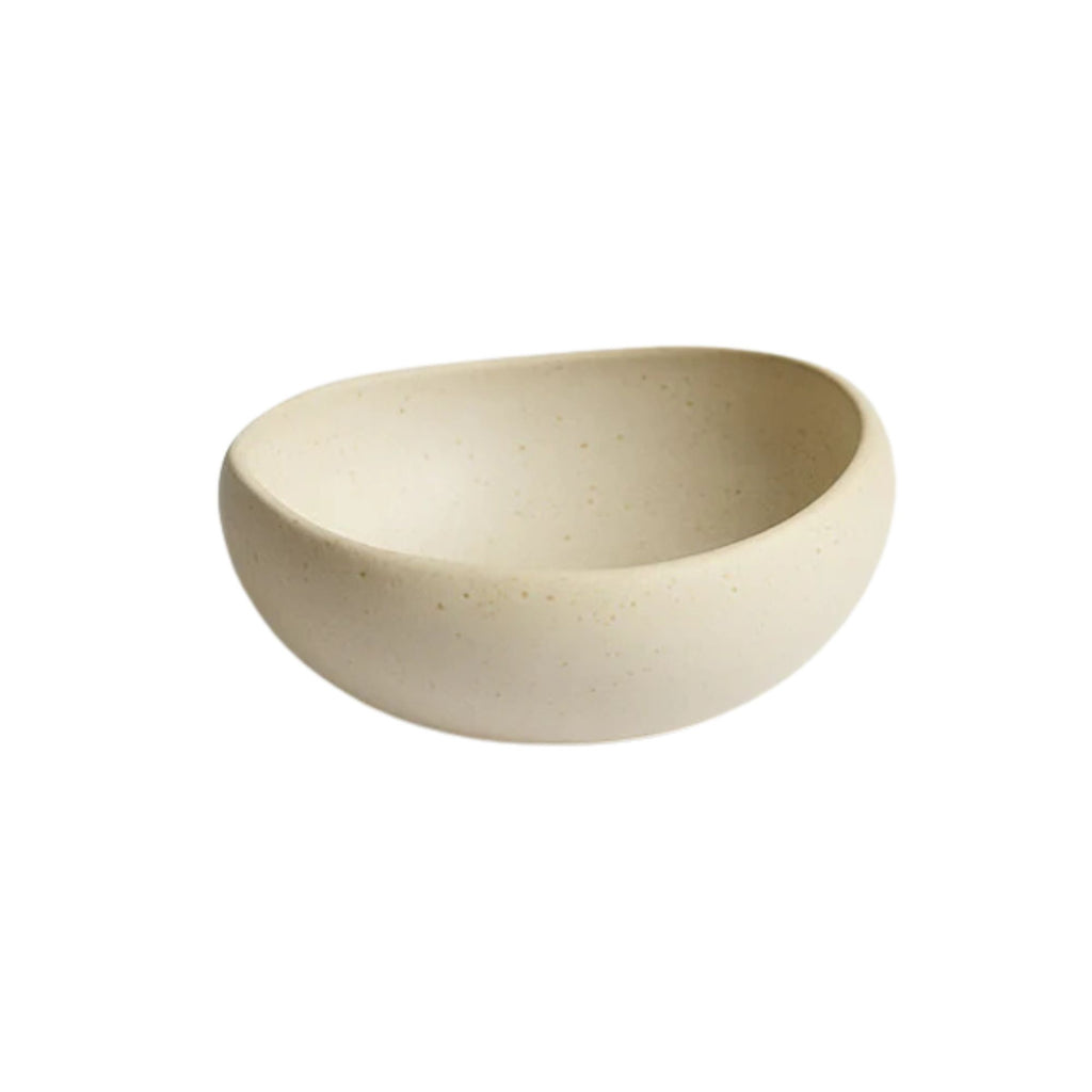 Beige ceramic bowl on a white background