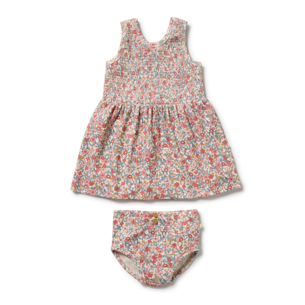 Floral dress and bloomers set on a white background
