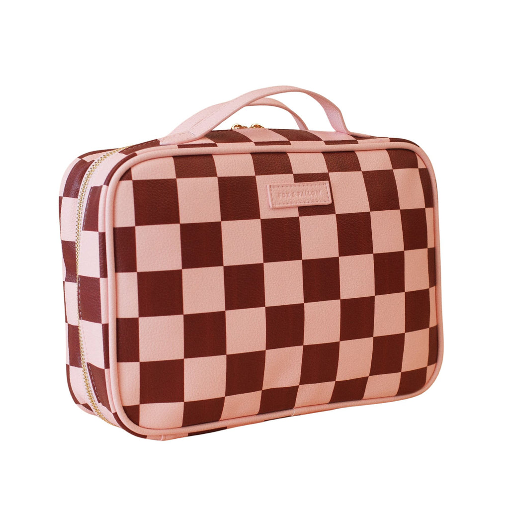 Checkered makeup bag with pink and brown pattern on a white background