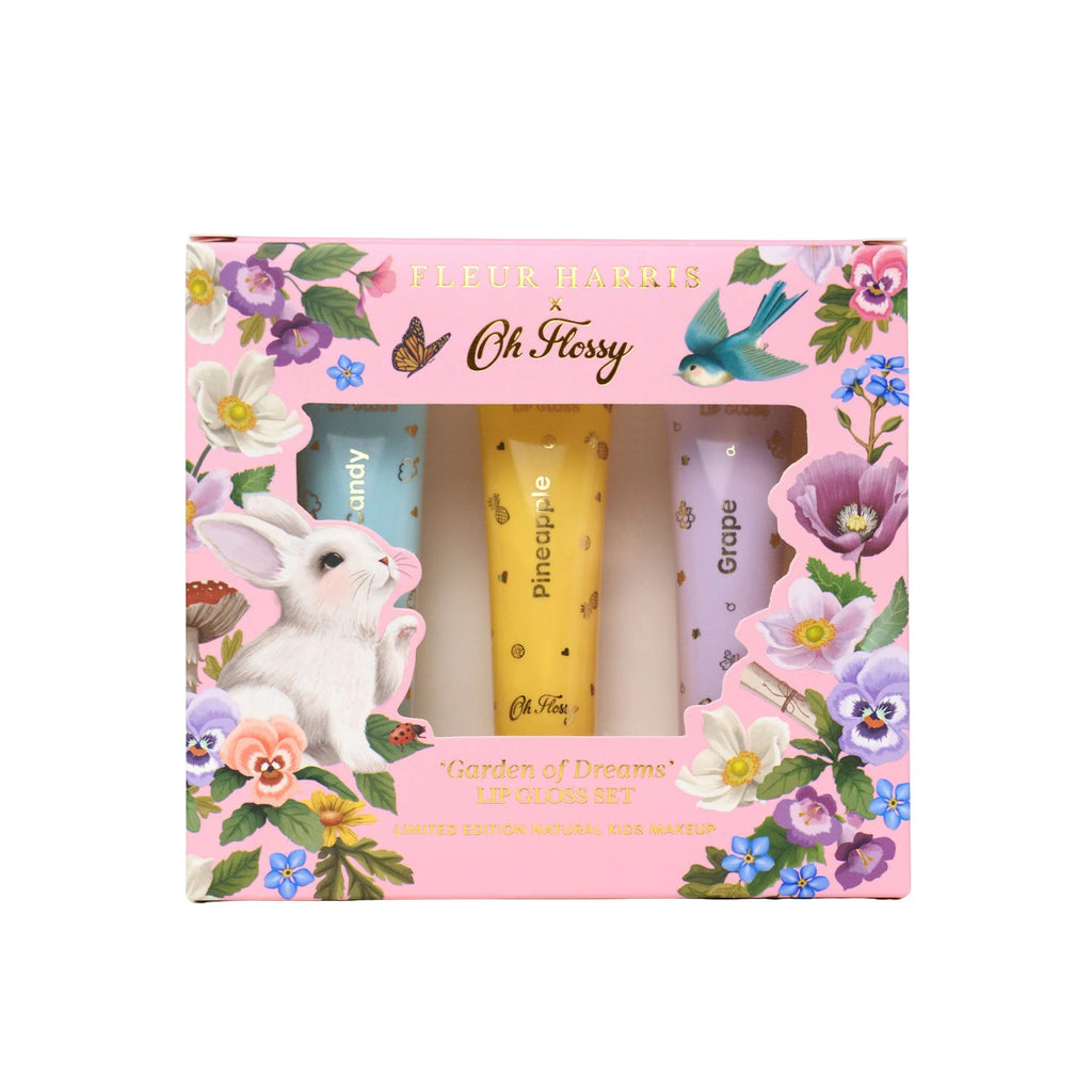 Lip balm set in a decorative box with floral and animal illustrations on a white background.