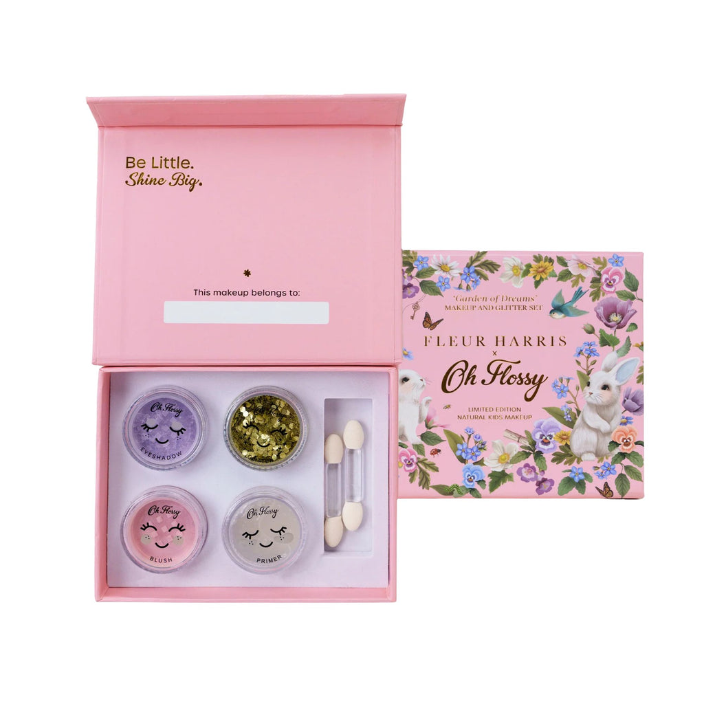 Makeup set with pink box and floral packaging featuring 'Fleur Harris'.
