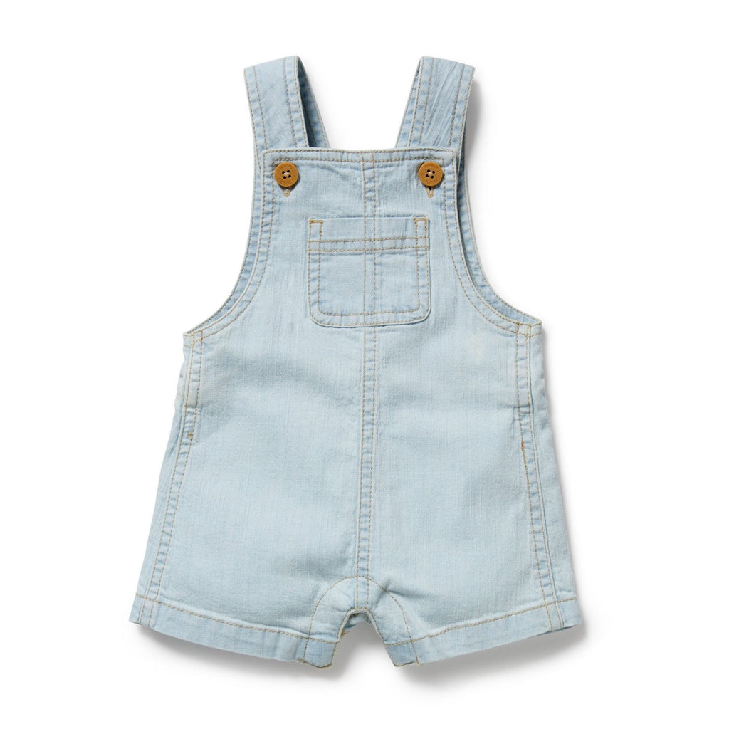 Light blue denim overalls with brown buttons on a white background