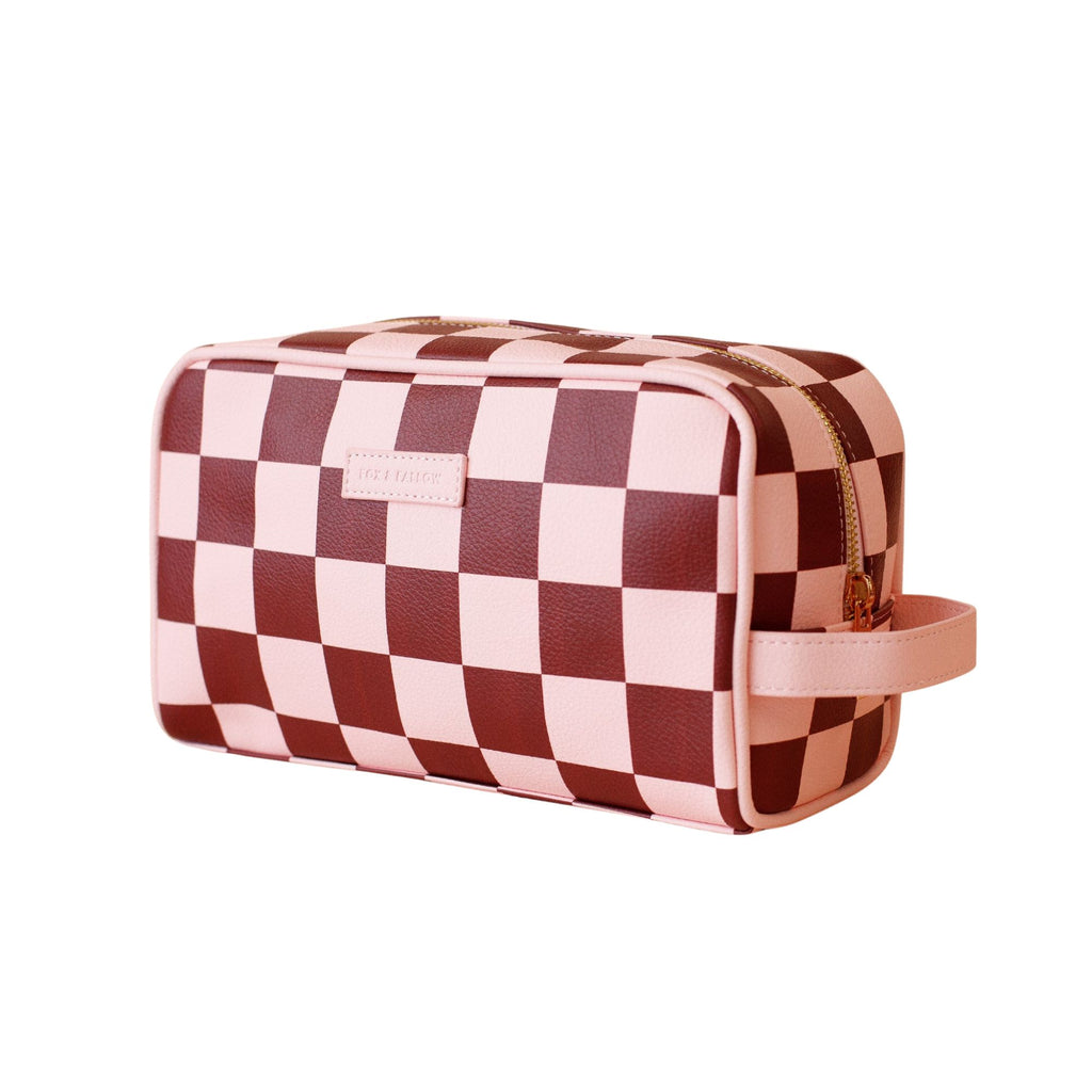 Checkered toiletry bag with a handle on a white background