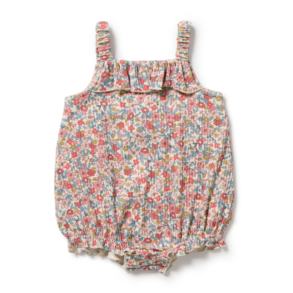 Floral baby romper on a white background
