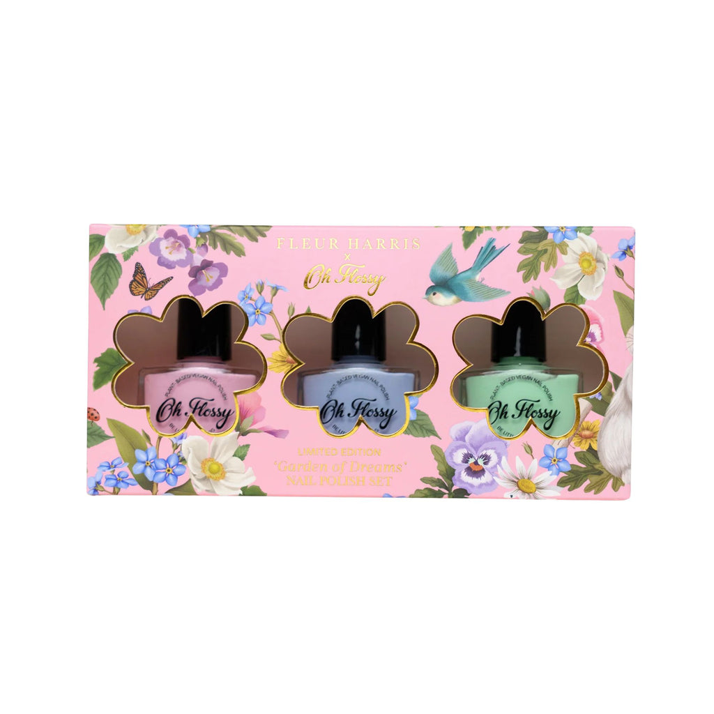 Set of three nail polish bottles in a floral packaging with 'Oh Flossy' branding.