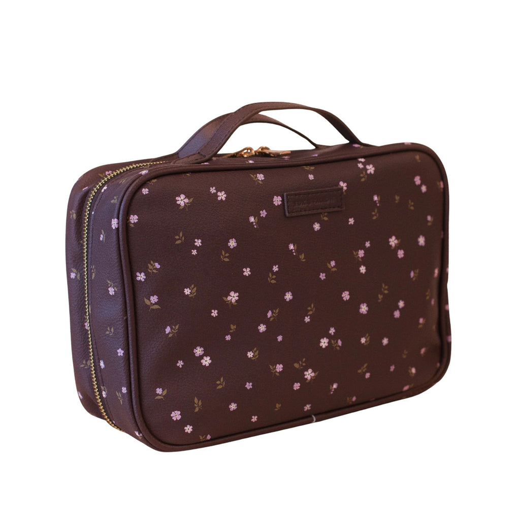 Floral-patterned travel case on a white background